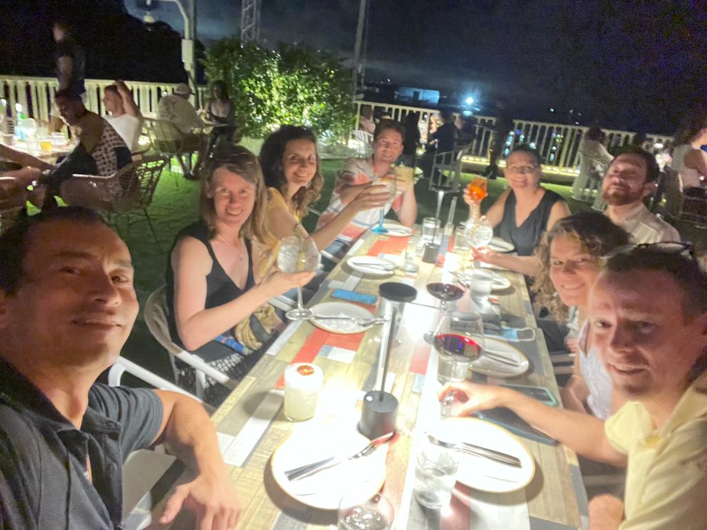 Friends in Panama City Panama enjoying dinner at a rooftop restaurant and bar