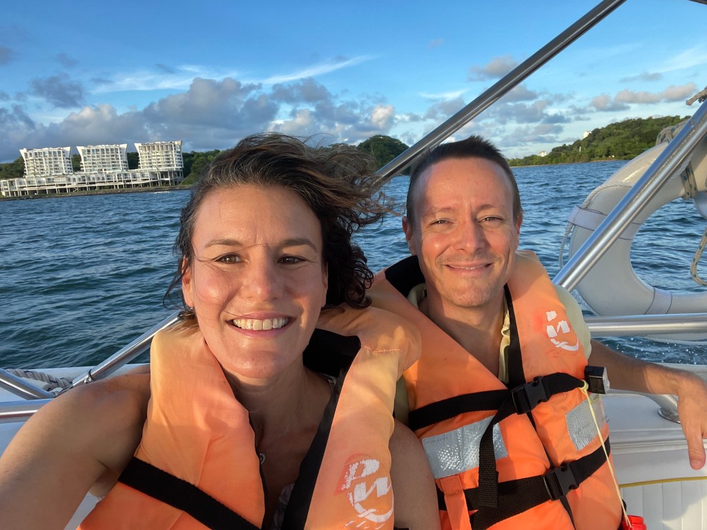 Jess and Cody on a boat in Panama City Panama